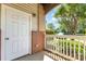 Exterior view of a doorway with white door, brick columns and a front porch at 11707 Ridgeway Park Dr, Charlotte, NC 28277