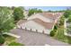 Aerial view of garages with gray parking lot and well-maintained landscaping at 11707 Ridgeway Park Dr, Charlotte, NC 28277