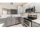 Modern kitchen featuring stainless steel appliances and white countertops at 11707 Ridgeway Park Dr, Charlotte, NC 28277