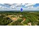 Aerial view of the area highlighting proximity to Lake Wylie and surrounding greenery at 1184 W Oak Dr, Rock Hill, SC 29732