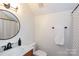 Clean and modern bathroom with updated fixtures and decorative mirror at 1184 W Oak Dr, Rock Hill, SC 29732