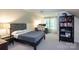 Cozy bedroom featuring a modern bed frame, a home office setup, and a bookshelf at 1184 W Oak Dr, Rock Hill, SC 29732