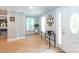 Inviting foyer with natural light, hardwood floors, and glass table at 1184 W Oak Dr, Rock Hill, SC 29732
