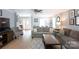 Cozy living room with hardwood floors, a modern area rug, and an inviting atmosphere at 1184 W Oak Dr, Rock Hill, SC 29732