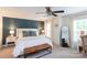 Cozy main bedroom featuring a king bed, decorative pillows, and soft natural light at 1184 W Oak Dr, Rock Hill, SC 29732