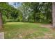 This home has a huge backyard with mature trees providing shade at 1208 Fordham Rd, Charlotte, NC 28208