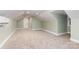 Bonus room featuring light carpet and a neutral paint color at 1208 Fordham Rd, Charlotte, NC 28208
