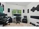 This modern bedroom features sound panels and ample lighting at 1212 Mason Way, Mount Holly, NC 28120