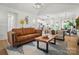 Open-concept living room flowing into a kitchen and dining area, great for entertaining guests at 1212 Mason Way, Mount Holly, NC 28120