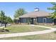 Exterior photo of the community clubhouse with sidewalk and landscaping at 13359 Caite Ridge Rd, Davidson, NC 28036