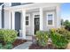 Inviting front porch with charming decor, offering a cozy and welcoming entrance to the home at 13359 Caite Ridge Rd, Davidson, NC 28036