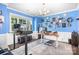 Bright home office with modern furniture, a large window, and ample workspace at 13359 Caite Ridge Rd, Davidson, NC 28036
