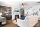 Cozy living room with a fireplace, built-in bookshelves, and comfortable seating at 13359 Caite Ridge Rd, Davidson, NC 28036