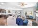 Open-concept living space with seamless flow to the kitchen and dining area at 13359 Caite Ridge Rd, Davidson, NC 28036