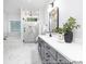 Bathroom featuring a walk-in shower, soaking tub, and double vanity at 1359 Russell St, Rock Hill, SC 29730