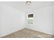 Cozy bedroom with neutral carpet and a window, creating a serene space at 1359 Russell St, Rock Hill, SC 29730