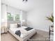 Bright bedroom featuring a cozy bed, natural light from the window, and neutral decor at 1359 Russell St, Rock Hill, SC 29730