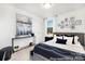 Elegant bedroom featuring stylish decor, a plush bed, and a gallery wall at 1359 Russell St, Rock Hill, SC 29730