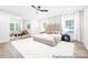 Spacious bedroom featuring a ceiling fan and adjoining seating area filled with natural light at 1359 Russell St, Rock Hill, SC 29730