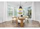 Breakfast nook with a glass table, 4 chairs, lots of natural light and a view of the outdoors at 1359 Russell St, Rock Hill, SC 29730