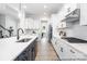 Bright kitchen with a large island, pendant lighting, and stainless steel appliances at 1359 Russell St, Rock Hill, SC 29730