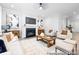 Cozy living room featuring a fireplace, built-ins, and lots of natural light at 1359 Russell St, Rock Hill, SC 29730