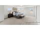 Main bedroom features a ceiling fan, carpet and three bright windows at 1359 Russell St, Rock Hill, SC 29730