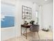 Cozy home office area with a modern desk, chair, and natural light from the window at 1359 Russell St, Rock Hill, SC 29730