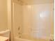 Simple bathroom featuring a shower-tub combo, a toilet, and neutral walls at 1367 Springview Ct, Rock Hill, SC 29732