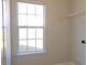 Efficient closet space is well-lit by a window and has wire shelving for storage at 1367 Springview Ct, Rock Hill, SC 29732