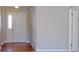 Welcoming entryway with a bright front door, hardwood floors, and a neutral color scheme at 1367 Springview Ct, Rock Hill, SC 29732
