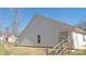 Charming home exterior with vinyl siding, wooden fence, and well-maintained lawn at 1367 Springview Ct, Rock Hill, SC 29732