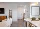 Open-concept view of the dining area featuring a bright table and open access to the stairs and living room at 14015 Penbury Ln # 373, Charlotte, NC 28278
