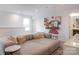 Comfortable living room with a large sectional and decorative accents at 14015 Penbury Ln # 373, Charlotte, NC 28278