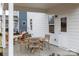 Stylish patio area includes a quaint seating area, perfect for outdoor entertaining and relaxation at 14015 Penbury Ln # 373, Charlotte, NC 28278