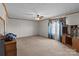 Bright bedroom with neutral walls, carpet, and a ceiling fan at 145 Mccreek Dr, China Grove, NC 28023