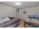 Bedroom features 2 twin beds and patterned walls at 145 Mccreek Dr, China Grove, NC 28023