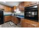 Functional kitchen with wood cabinets, modern appliances and countertop space at 145 Mccreek Dr, China Grove, NC 28023
