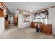 Inviting living area with an abundance of natural light, a table and entryways to other rooms at 145 Mccreek Dr, China Grove, NC 28023