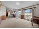Open-concept living area with a large window and entryway, plenty of natural light at 145 Mccreek Dr, China Grove, NC 28023