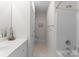 Bathroom features a tiled shower, toilet, and vanity with sink at 155 Harper Lee St, Davidson, NC 28036