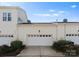 Two-car garage providing ample parking and storage, plus additional storage space at 155 Harper Lee St, Davidson, NC 28036