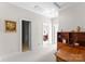 Hallway with artwork, wood floors, and neutral walls at 155 Harper Lee St, Davidson, NC 28036