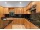 Spacious kitchen featuring an island, stainless steel appliances, and ample counter space at 155 Harper Lee St, Davidson, NC 28036