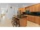 Spacious kitchen featuring an island, stainless steel appliances, and ample counter space at 155 Harper Lee St, Davidson, NC 28036