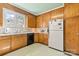 Traditional kitchen with ample cabinet space and white appliances at 1574 Jarrett Farm Rd, Newton, NC 28658