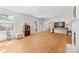 Inviting living room with hardwood floors, built-ins, and a fireplace at 1574 Jarrett Farm Rd, Newton, NC 28658