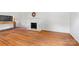 Spacious living room featuring hardwood floors and a classic fireplace at 1574 Jarrett Farm Rd, Newton, NC 28658