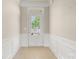 Foyer with tiled floor and decorative wainscoting at 16291 Raven Crest Dr, Indian Land, SC 29707