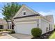 Garage entrance with trimmed shrubbery at 16291 Raven Crest Dr, Indian Land, SC 29707